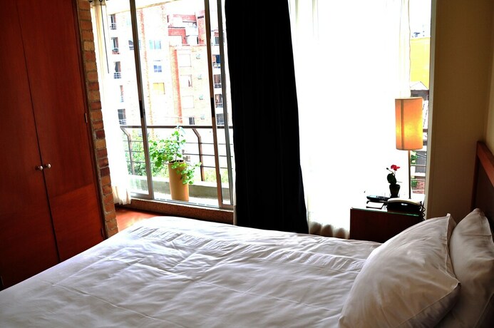 Imagen de la habitación del Hotel Viaggio Studios. Foto 12