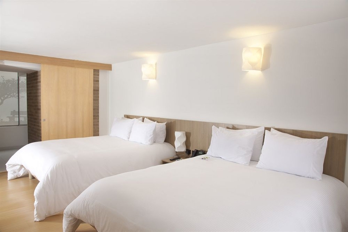 Imagen de la habitación del Hotel Viaggio Teleport Suites. Foto 10