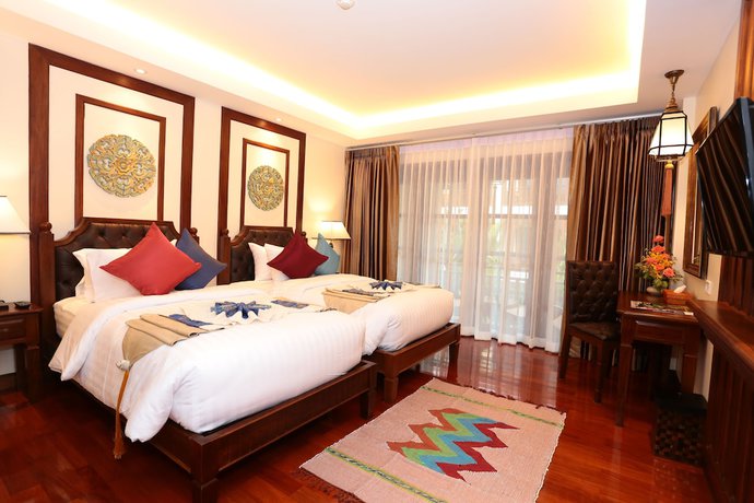 Imagen de la habitación del Hotel Viangluang Resort. Foto 5