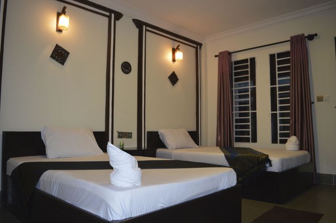 Imagen de la habitación del Hotel Vibola Guesthouse. Foto 9