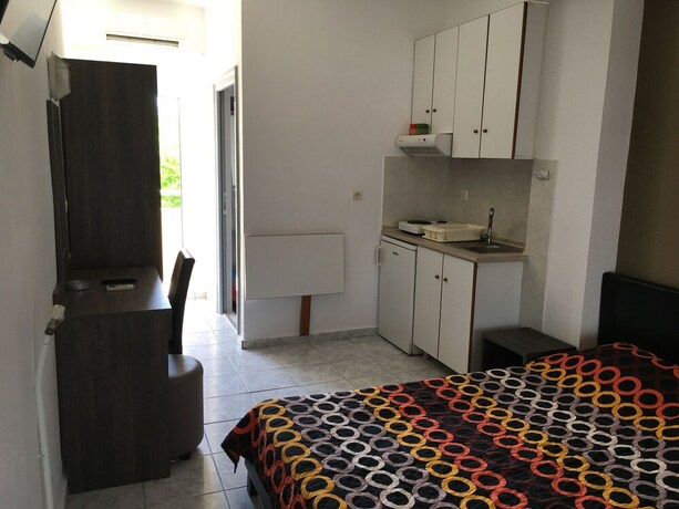 Imagen de la habitación del Hotel Vicky Rooms. Foto 20