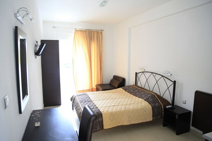 Imagen de la habitación del Hotel Vicky Rooms. Foto 26