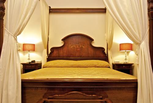 Imagen de la habitación del Hotel Vico Regio. Foto 3