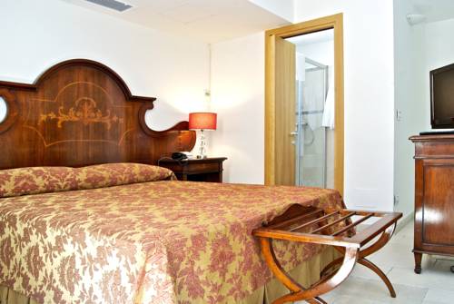 Imagen de la habitación del Hotel Vico Regio. Foto 7