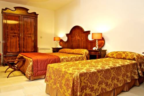 Imagen de la habitación del Hotel Vico Regio. Foto 9