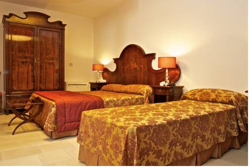 Imagen de la habitación del Hotel Vico Regio. Foto 10