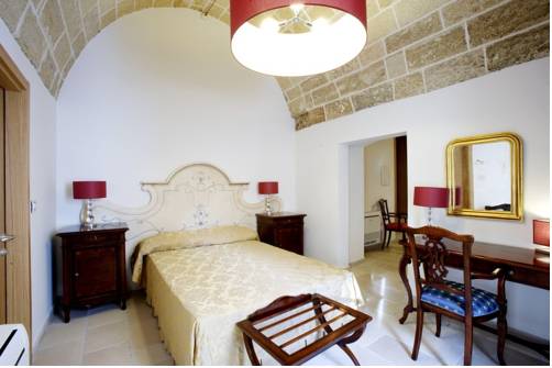 Imagen de la habitación del Hotel Vico Regio. Foto 11