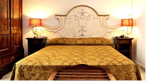 Imagen de la habitación del Hotel Vico Regio. Foto 12