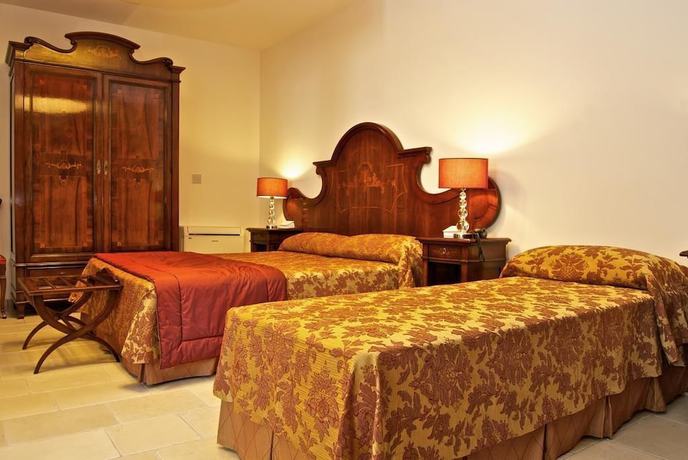 Imagen de la habitación del Hotel VicoRegio. Foto 15