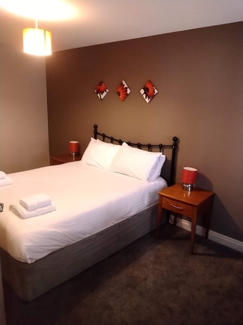 Imagen de la habitación del Hotel Victoria Cloisters Apartments. Foto 9