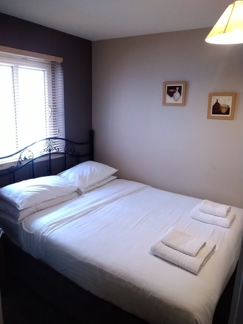 Imagen de la habitación del Hotel Victoria Cloisters Apartments. Foto 15