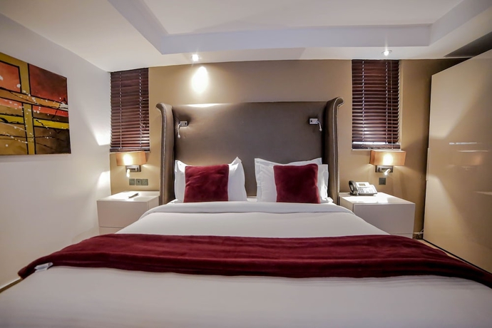 Imagen de la habitación del Hotel Victoria Crown Plaza. Foto 5