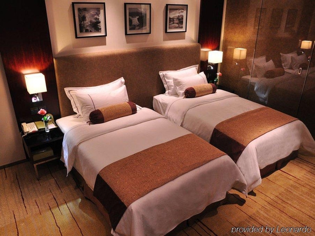 Imagen de la habitación del Hotel Victoria, Guangzhou. Foto 2