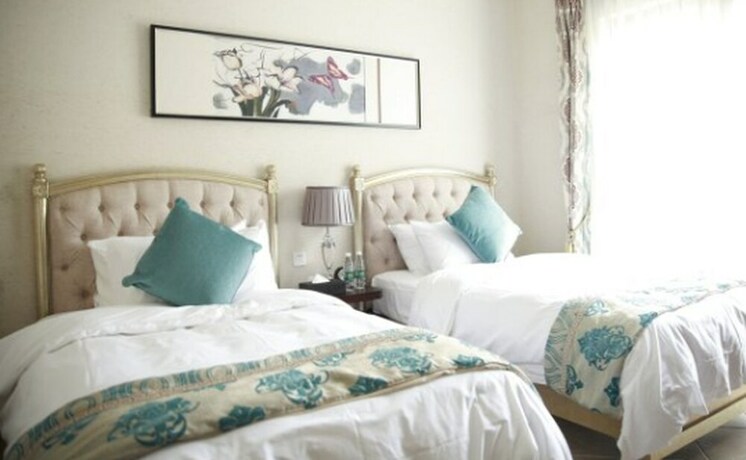 Imagen de la habitación del Hotel Victoria Huizhou. Foto 18