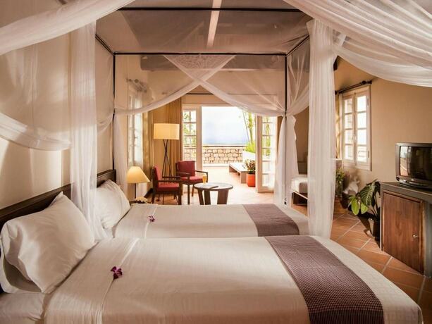 Imagen de la habitación del Hotel Victoria Nui Sam Lodge. Foto 25