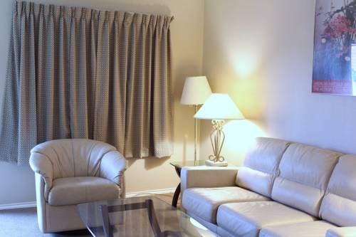 Imagen de la habitación del Hotel Victoria Palms Inn And Suites. Foto 14