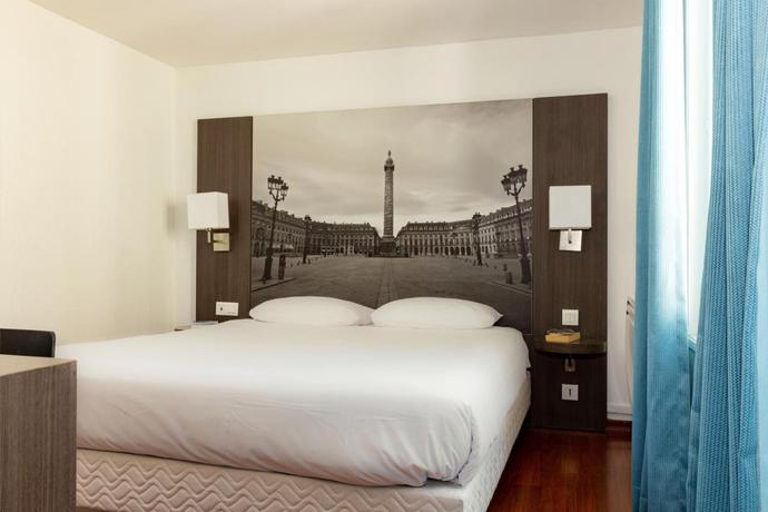 Imagen de la habitación del Hotel Victoria, París. Foto 3