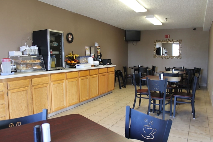 Imagen del bar/restaurante del Hotel Victorian Inn and Suites. Foto 2