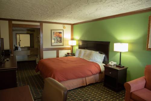 Imagen de la habitación del Hotel Victorian Inn and Suites. Foto 2