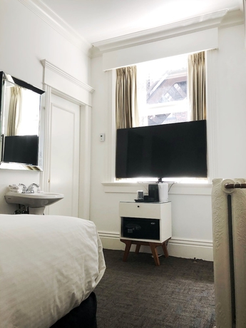 Imagen de la habitación del Hotel Victorian, Vancouver. Foto 3