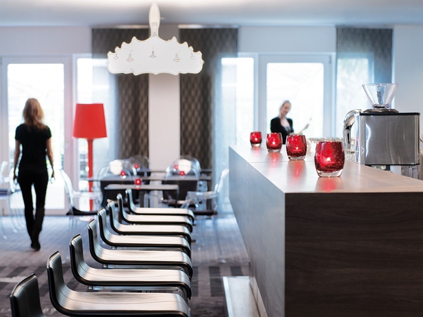 Imagen del bar/restaurante del Hotel Victor's Residenz-hotel München. Foto 3