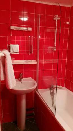 Imagen de la habitación del Hotel Victory Galou. Foto 8