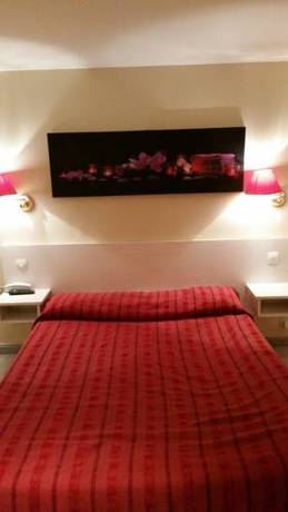 Imagen de la habitación del Hotel Victory Galou. Foto 11