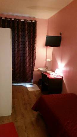 Imagen de la habitación del Hotel Victory Galou. Foto 15