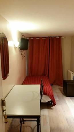 Imagen de la habitación del Hotel Victory Galou. Foto 16