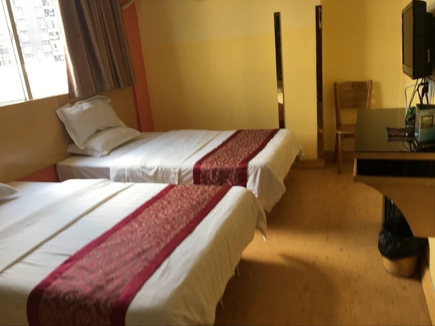 Imagen de la habitación del Hotel Victory, Guangzhou. Foto 4