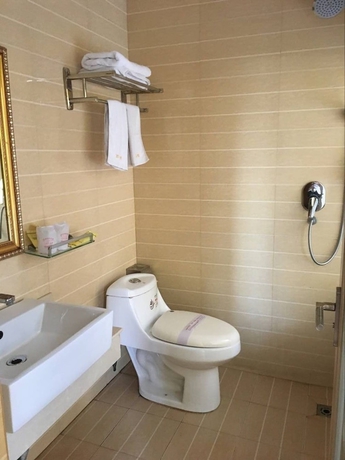 Imagen de la habitación del Hotel Victory, Guangzhou. Foto 14