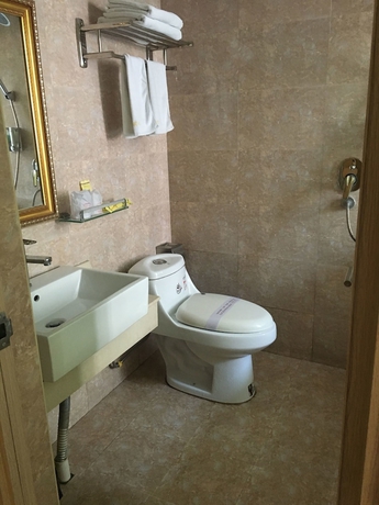 Imagen de la habitación del Hotel Victory, Guangzhou. Foto 15
