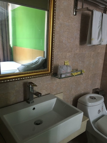 Imagen de la habitación del Hotel Victory, Guangzhou. Foto 17