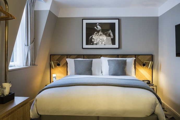 Imagen de la habitación del Hotel Victory House London. Foto 14