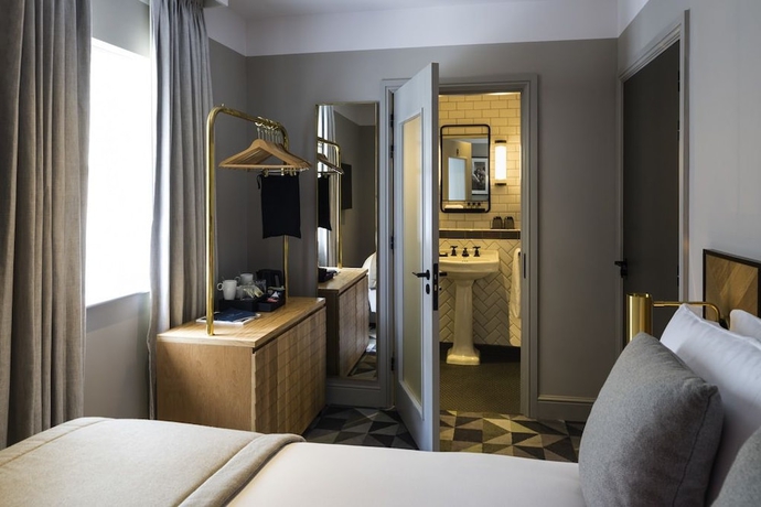 Imagen de la habitación del Hotel Victory House London. Foto 17