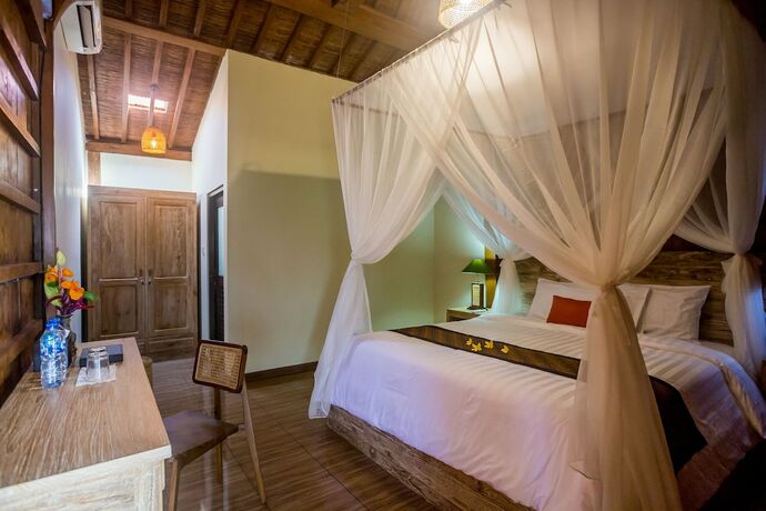 Imagen de la habitación del Hotel Victory Munggu by ecommerceloka. Foto 16