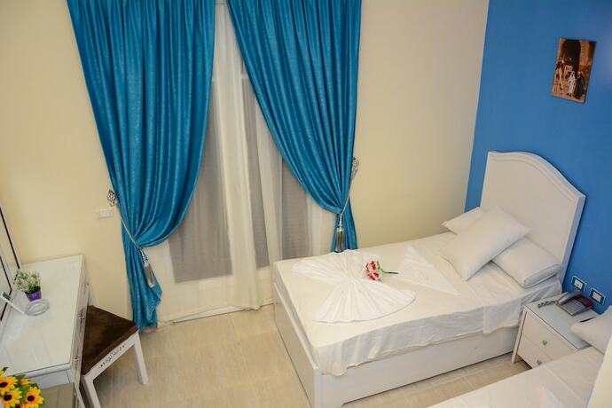 Imagen de la habitación del Hotel Victory Of Downtown. Foto 12