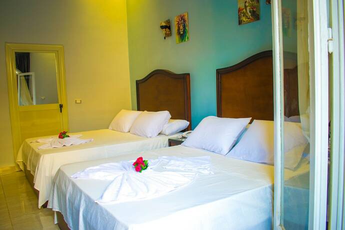Imagen de la habitación del Hotel Victory Of Downtown. Foto 15