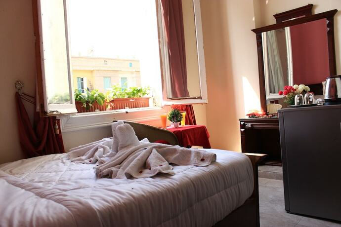 Imagen de la habitación del Hotel Victory Of Downtown. Foto 16