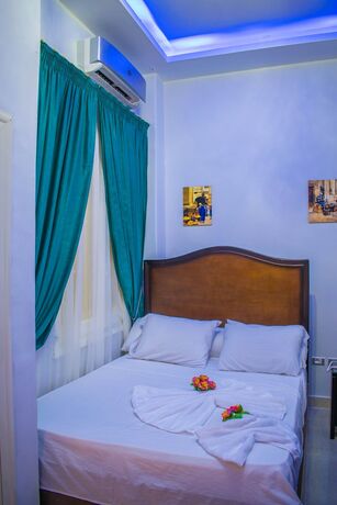 Imagen de la habitación del Hotel Victory Of Downtown. Foto 17