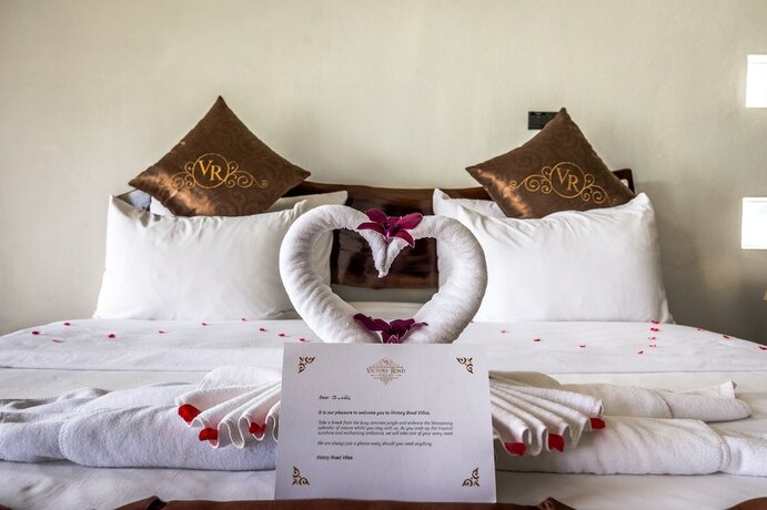 Imagen de la habitación del Hotel Victory Road Villas. Foto 29