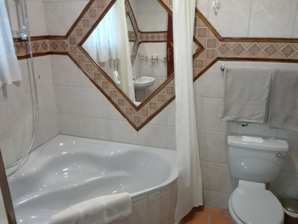 Imagen de la habitación del Hotel Vido Lodge and Conference Center. Foto 16