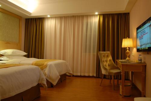 Imagen de la habitación del Hotel Vienna 3 Best Exhibition Center Chigang Road. Foto 6
