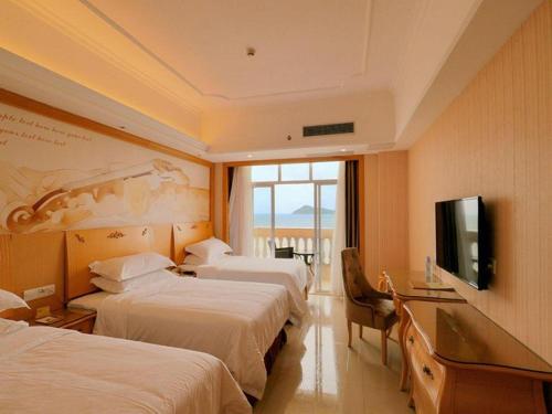 Imagen de la habitación del Hotel Vienna Classic Hotel Guangdong Yangxi Moon Bay. Foto 4