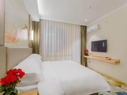 Imagen de la habitación del Hotel Vienna Classic Mudanjiang Railway Station. Foto 13