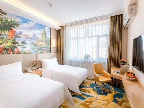 Imagen de la habitación del Hotel Vienna Classic Mudanjiang Railway Station. Foto 17