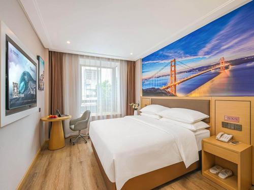 Imagen de la habitación del Hotel Vienna Classic Wenzhou Cangnan High-Speed Railway Station Shop. Foto 17