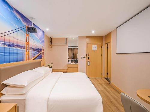 Imagen de la habitación del Hotel Vienna Classic Wenzhou Cangnan High-Speed Railway Station Shop. Foto 19