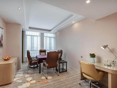 Imagen de la habitación del Hotel Vienna Danyang Glasses City High Speed Railway Station Dabo. Foto 18