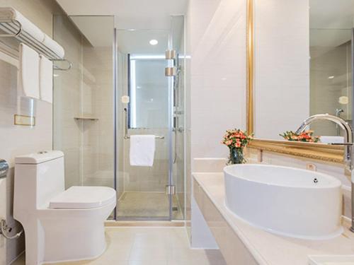 Imagen de la habitación del Hotel Vienna Dongguan Fenggang Yongsheng Street. Foto 5